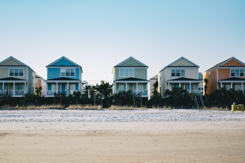 row of homes on beach