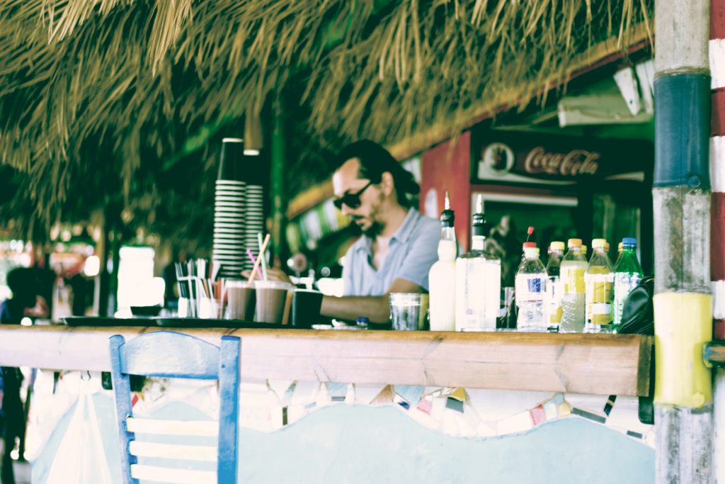 bartender making cocktail atBonita Springs beach bar